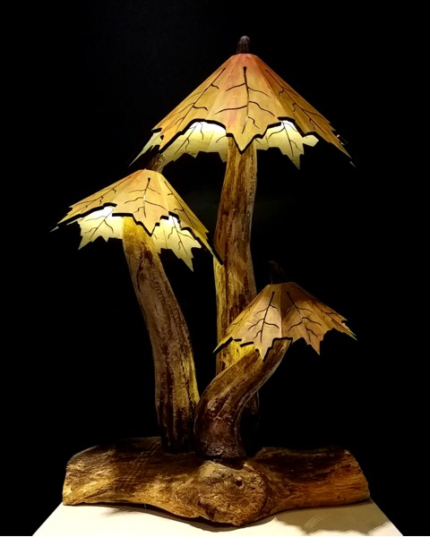 The "New England Autumn" lighted sculpture is part of the Mushroom collection which is very organic in design